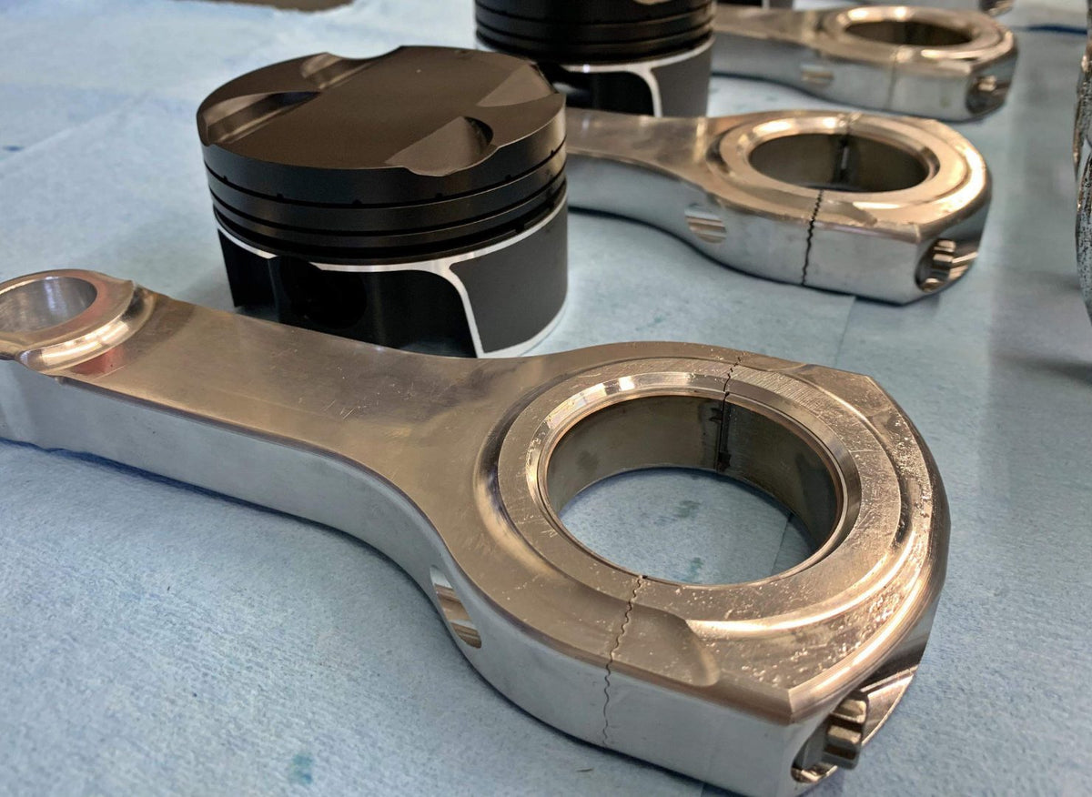 Forged piston and connecting rod components for the Evo X
