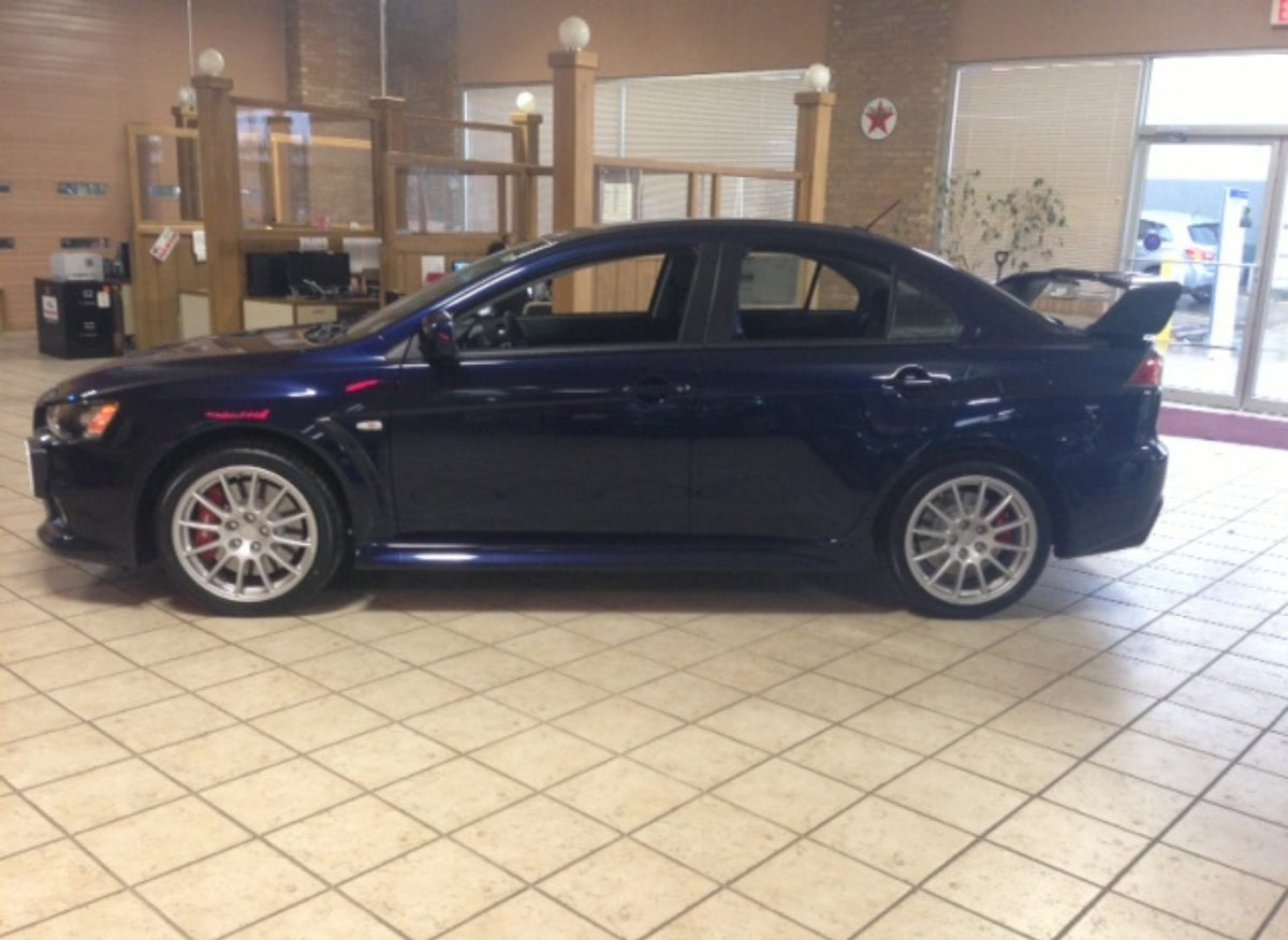 Dark blue Mitsubishi Evo X before the drag-car build