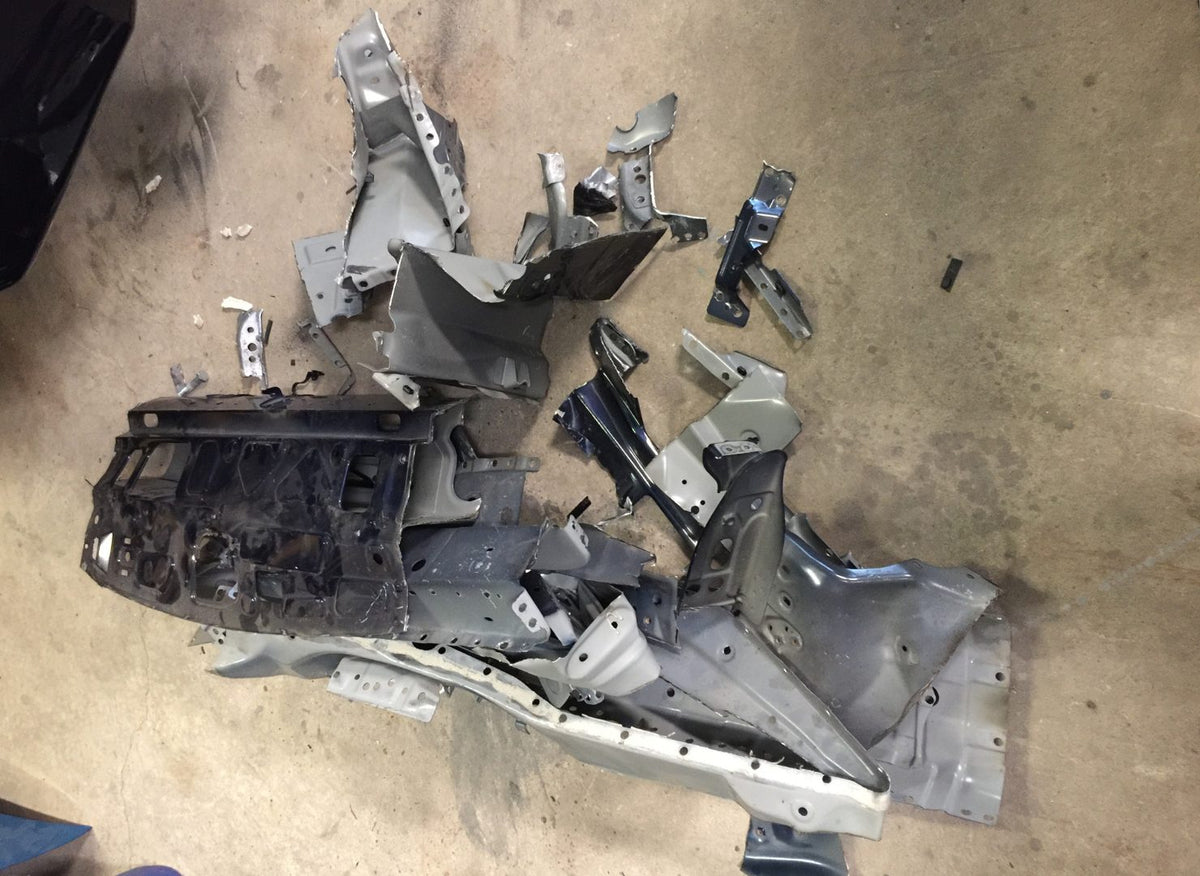 Factory Evo X suspension and chassis parts removed during the build