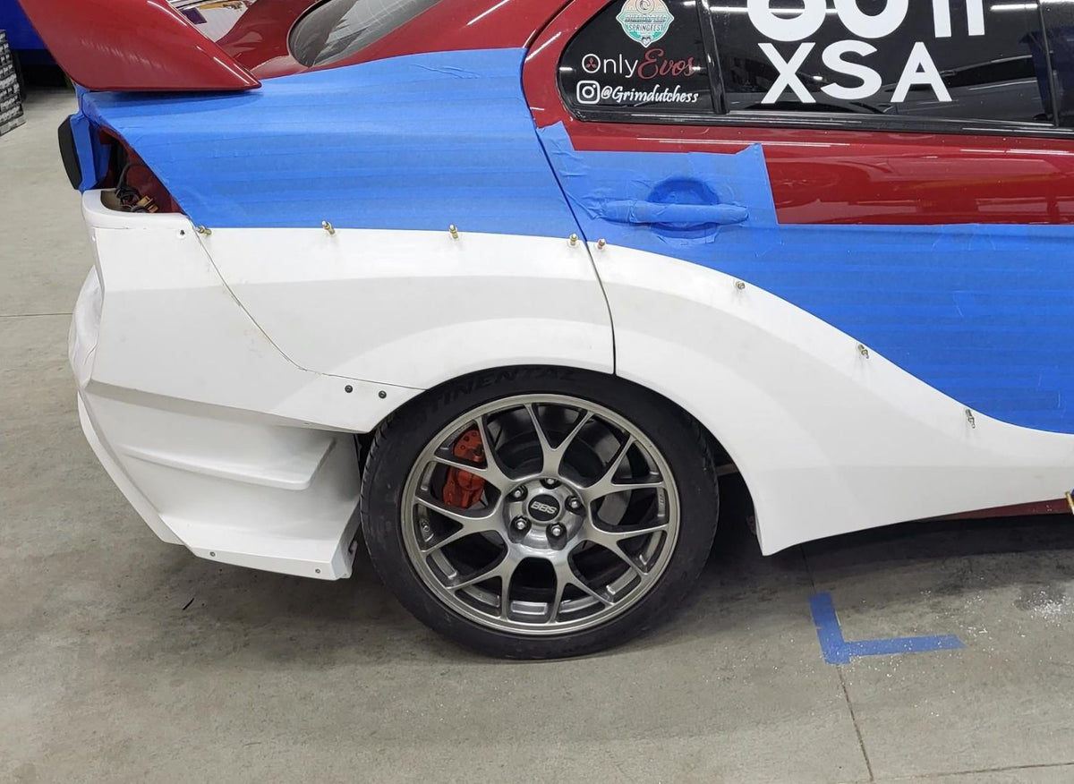 Close-up of the Evo X rear-quarter widebody fitment