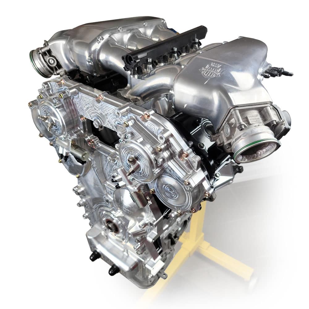 Magnus billet front timing cover mounted on VR38 block, three-quarter view
