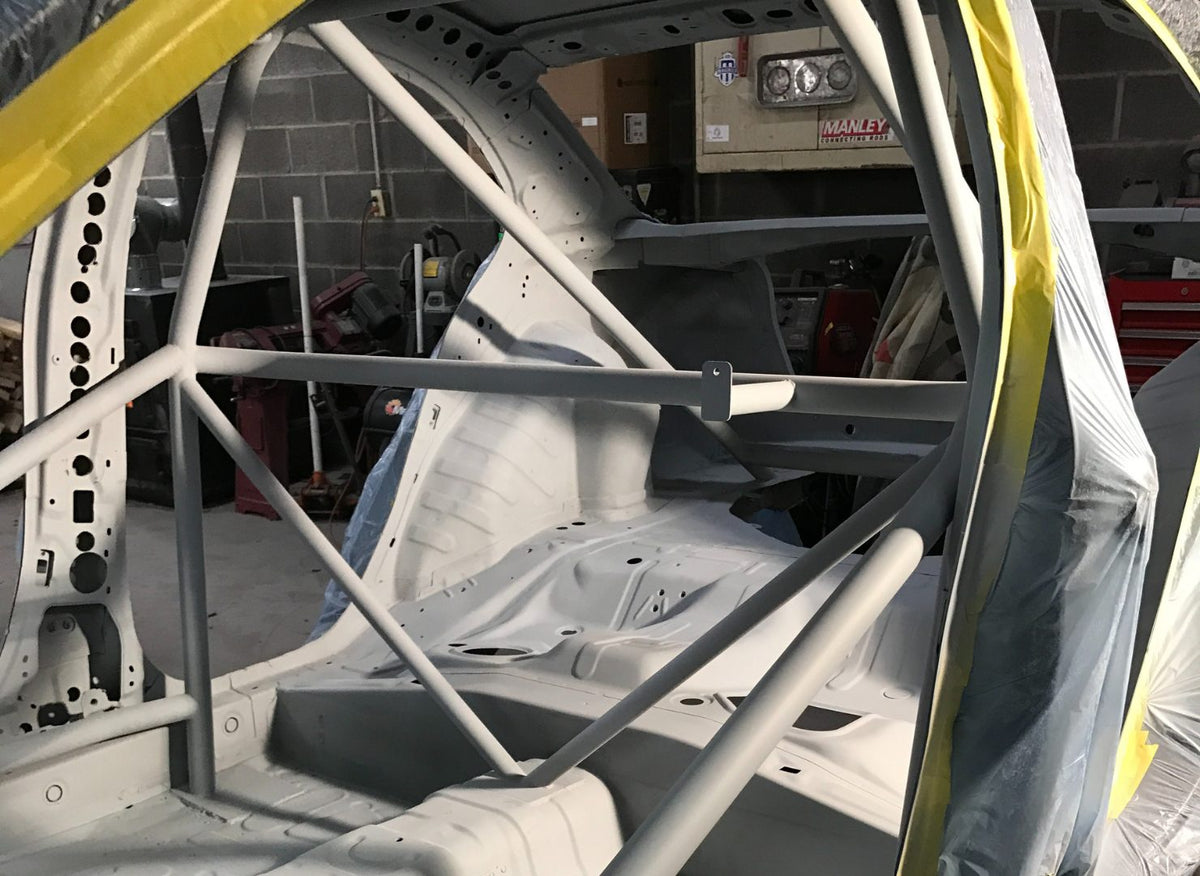 Interior of an Evo X with a welded roll cage