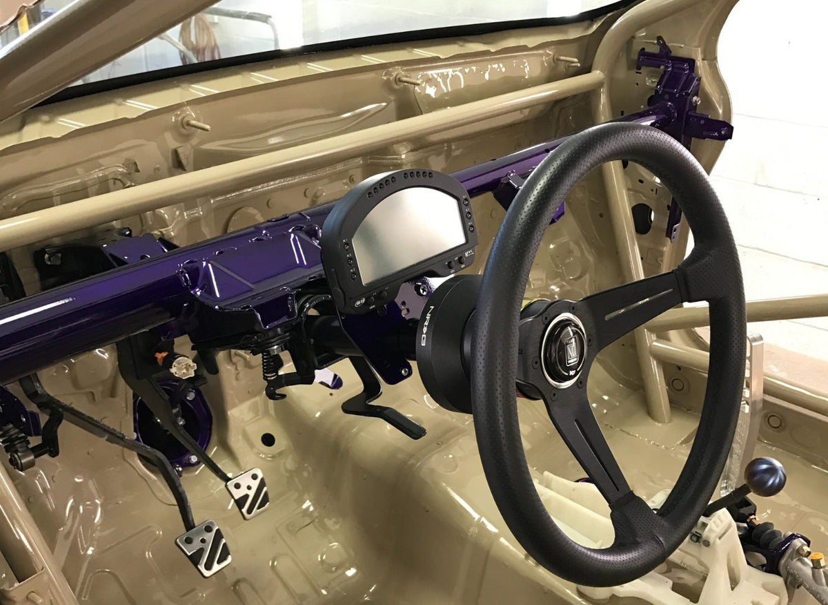 Evo X driver controls with steering wheel and shifter