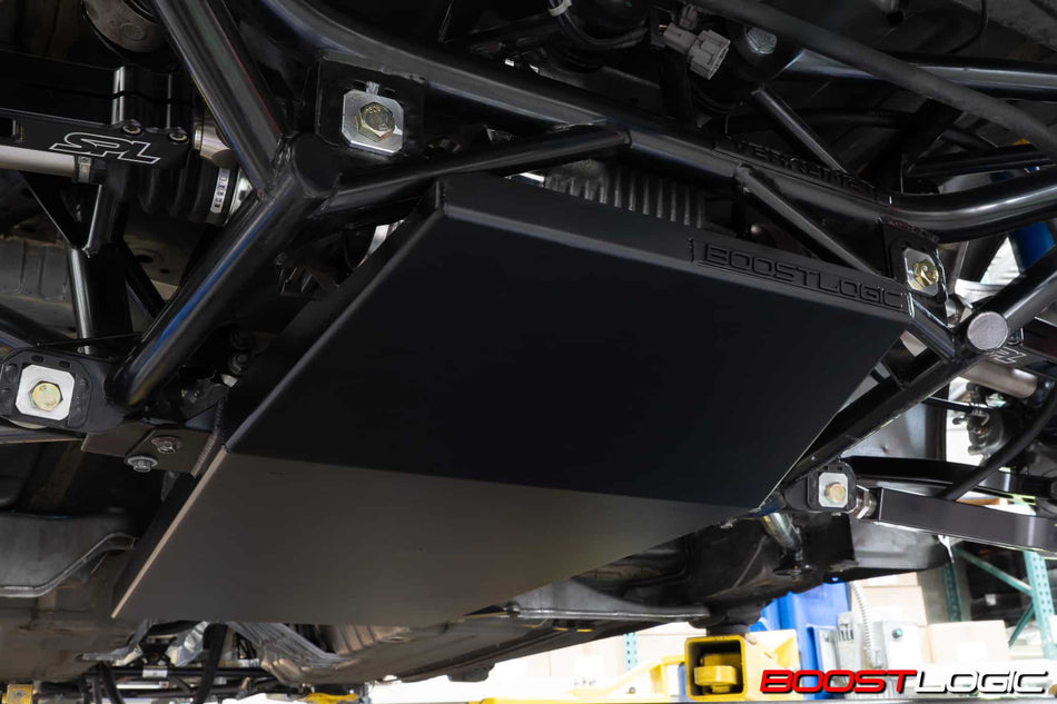 Boost Logic R35 transmission belly pan with pig mat retaining mesh