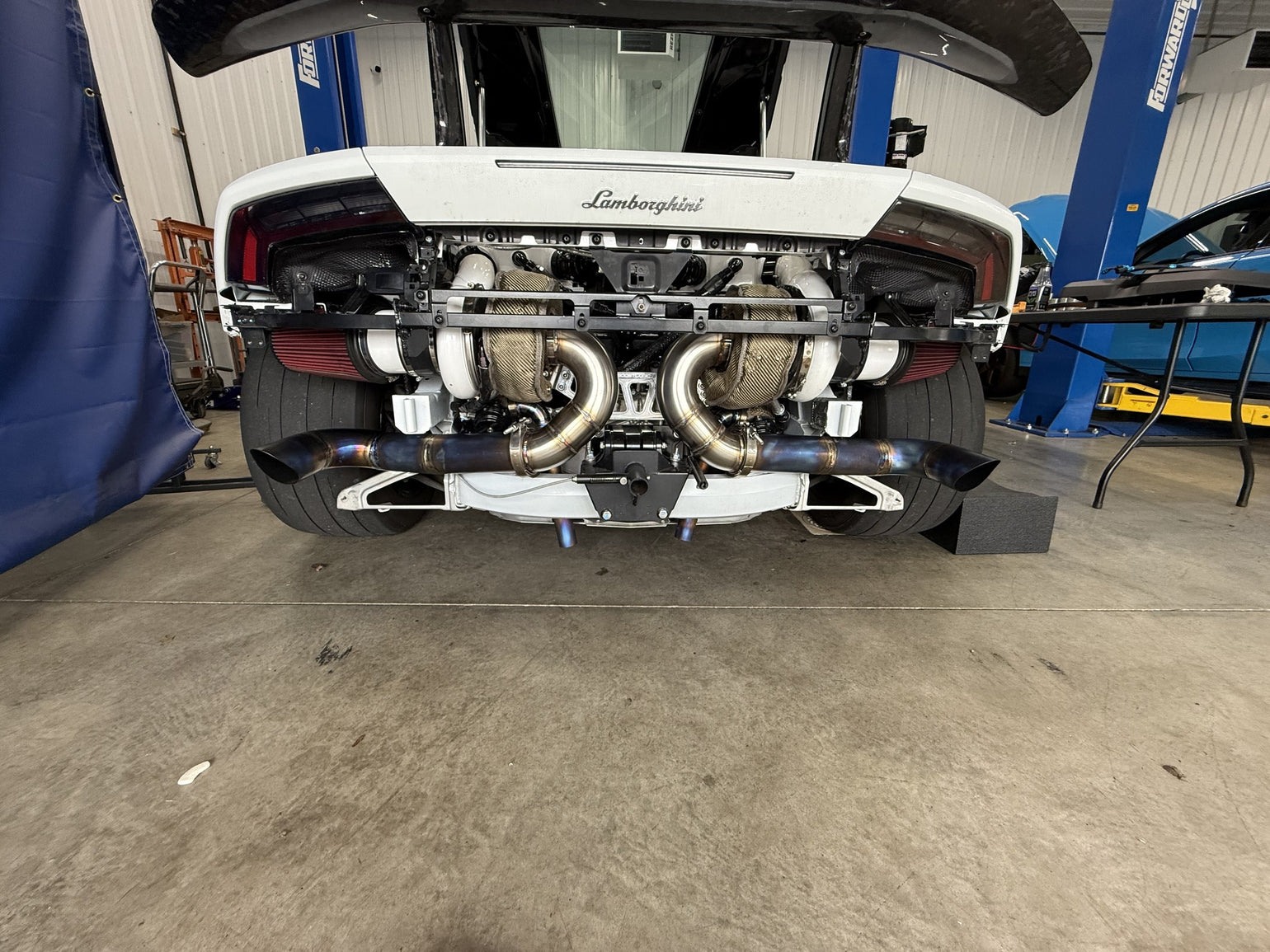 Twin-turbo exhaust fabrication on a Lamborghini