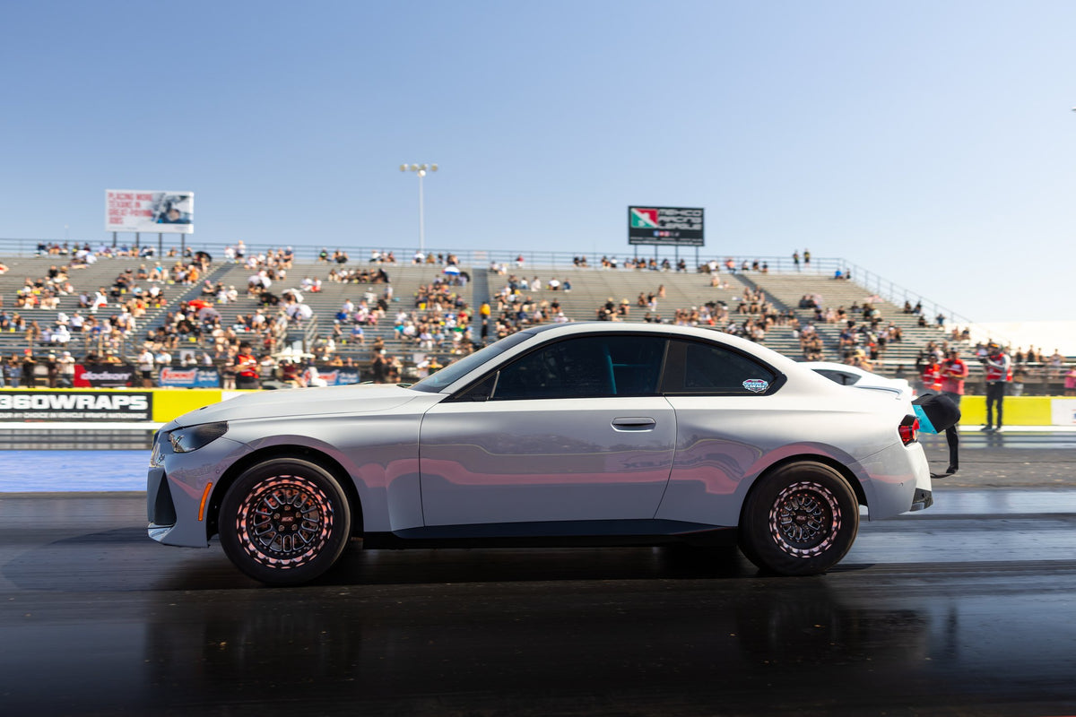 Grade A Garage BMW M240 parked trackside at the drag strip